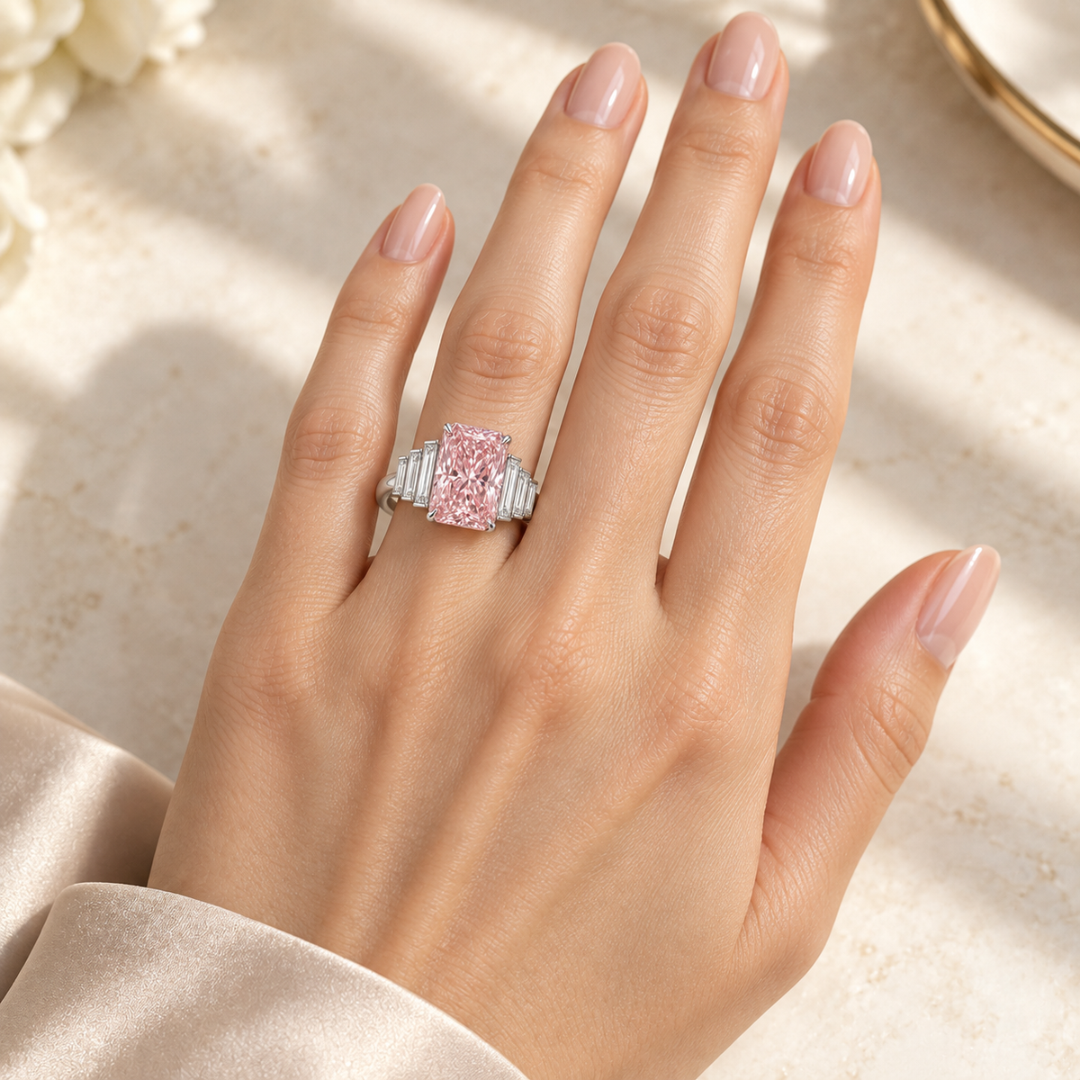 Blush Palisade ring worn on a model’s left ring finger