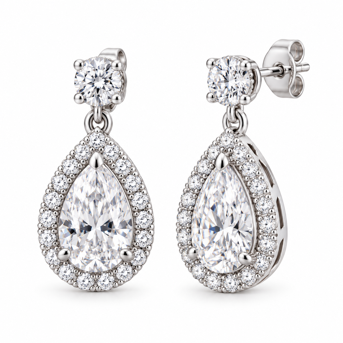 Cora pear halo drop earrings in 14K white gold, on a clean white background, front hero view.