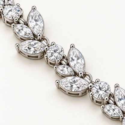 Detail of Willow Drop necklace marquise leaf links, round diamonds and open setting sides