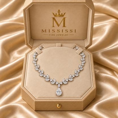 Willow Drop necklace in champagne MISSISSI packaging with the official crowned-M logo