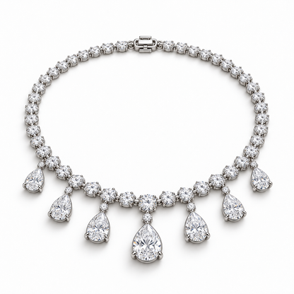 Angled view of Dew Garland necklace showing the round diamond line and seven pear drops