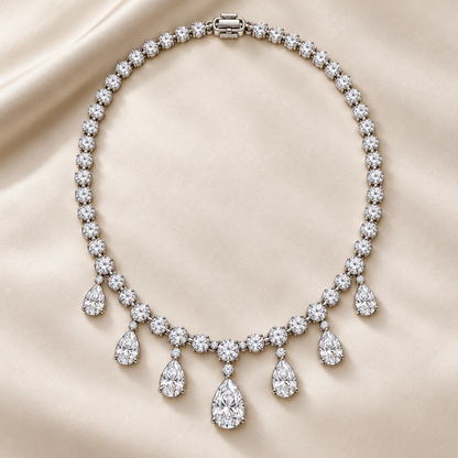 Dew Garland necklace on pale satin with all seven pear drops visible