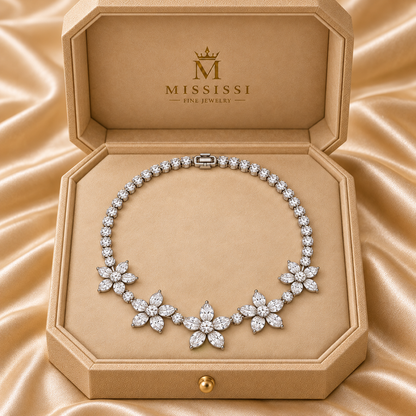 Five Petals necklace in champagne MISSISSI packaging with official crown-M and wordmark
