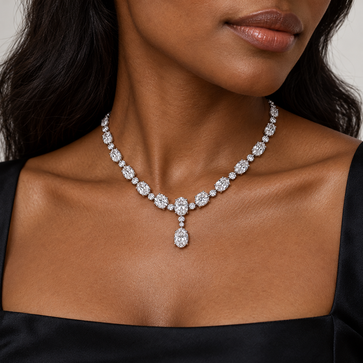 MISSISSI Oval Sonata Graduated Oval lab-grown diamond necklace design, wearing visualization on a dark-skinned adult model