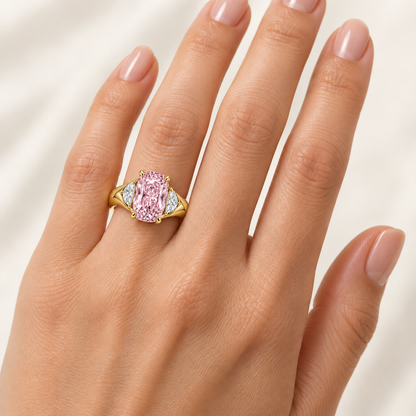 Blush Meridian pink cushion lab-grown diamond ring in yellow gold, worn on a left ring finger