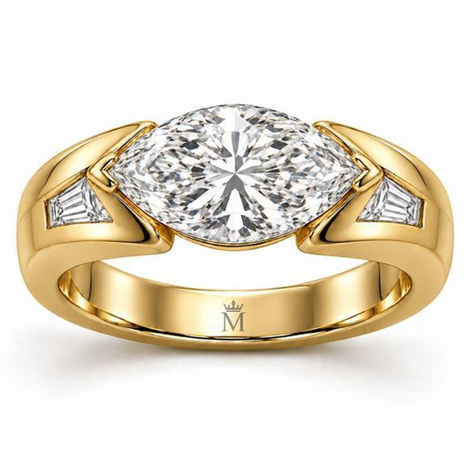 Marquise Horizon yellow-metal ring with an east-west marquise center and two tapered baguette accents, front design view