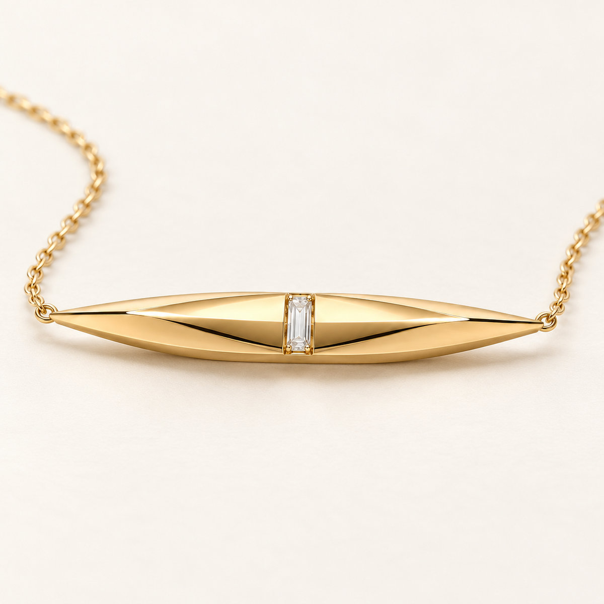 MISSISSI FACET LINE design visualization in yellow gold, low-angle view of the elongated pendant and fine chain.