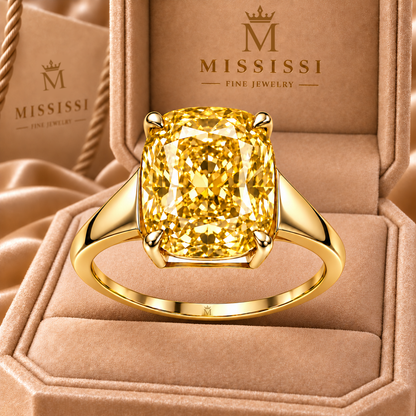 Golden Aperture yellow cushion lab-grown diamond ring, close-up design visualization in champagne MISSISSI packaging