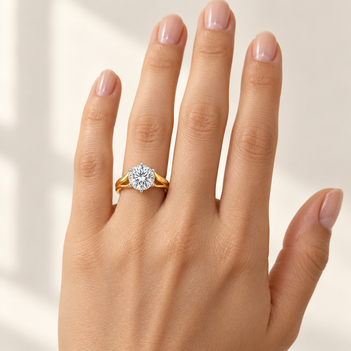 Arcform white round lab-grown diamond ring, worn on the left-hand ring finger