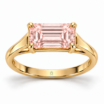 MISSISSI J02 pink emerald-cut ring with four corner claws and open triangular yellow-metal shoulders, front view
