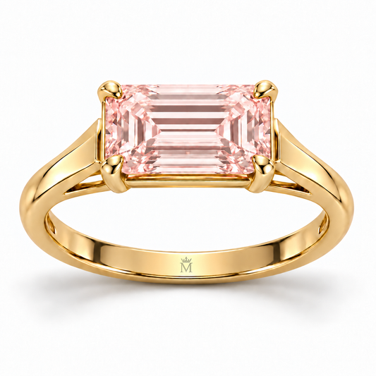 MISSISSI J02 pink emerald-cut ring with four corner claws and open triangular yellow-metal shoulders, front view
