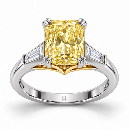 MISSISSI J03 yellow radiant-cut ring with two white tapered baguettes, white-metal band and yellow-metal gallery, front view