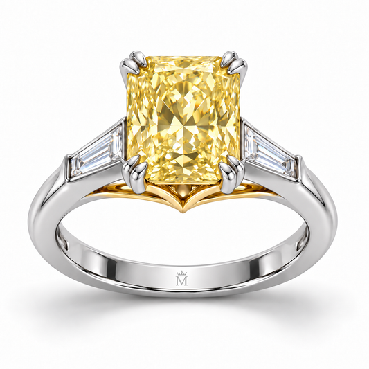 MISSISSI J03 yellow radiant-cut ring with two white tapered baguettes, white-metal band and yellow-metal gallery, front view