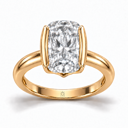 MISSISSI J04 elongated colorless cushion ring held by two yellow-metal long-side half-bezels, front view