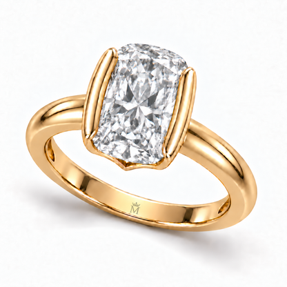 Three-quarter view of MISSISSI J04 colorless elongated cushion ring with smooth yellow-metal band and half-bezel setting