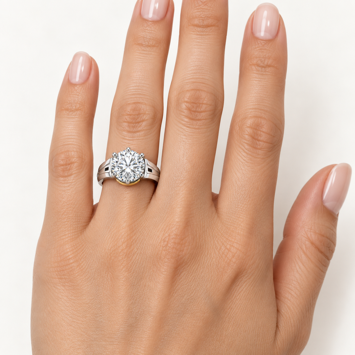 Round Passage white round brilliant lab-grown diamond ring, worn on the left ring finger