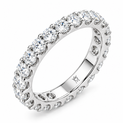 Lumen round diamond full-eternity wedding band in 14K white gold, on a clean white background, front hero view.