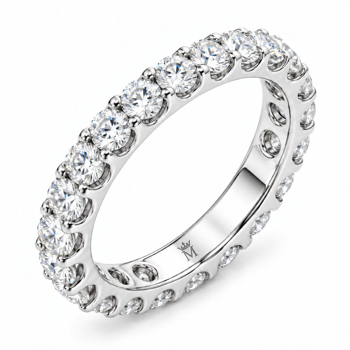 Lumen round diamond full-eternity wedding band in 14K white gold, interior crowned-M hallmark detail.