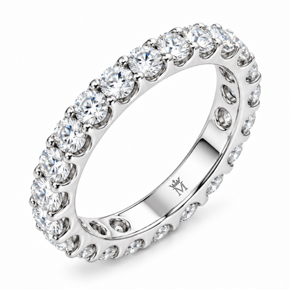 Lumen round diamond full-eternity wedding band in 14K white gold, close-up of the diamond setting.