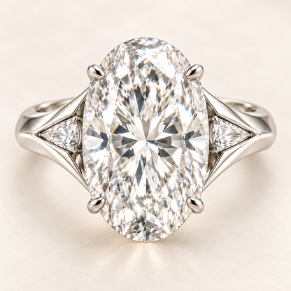 Luminous Fold oval diamond ring with two tapered triangular side diamonds, front view