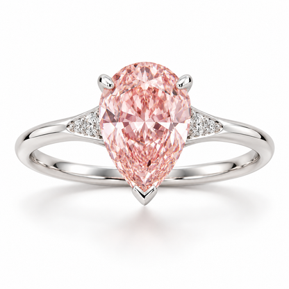 Front AI design preview of a pear-shaped pink lab-grown diamond ring with a V-tip and tapered white diamond shoulder accents in white-gold appearance.