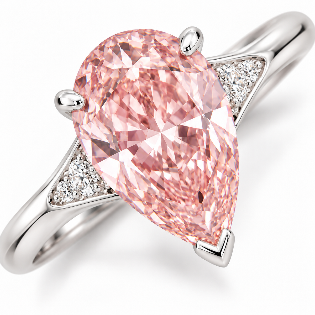 Tight diagonal top-detail AI view of the pink pear center, two rounded-end claws, protective V-tip and graduated white shoulder accents.