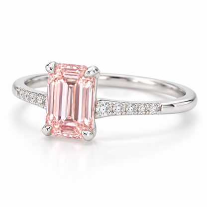 Left oblique AI view of the slender pink step-cut center and a single line of white shoulder accents.