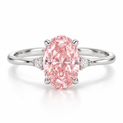 AI front design view of an oval pink lab-grown center with small white shoulder accents and a slender white-gold band.
