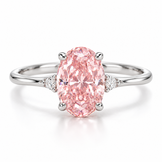 AI front design view of an oval pink lab-grown center with small white shoulder accents and a slender white-gold band.