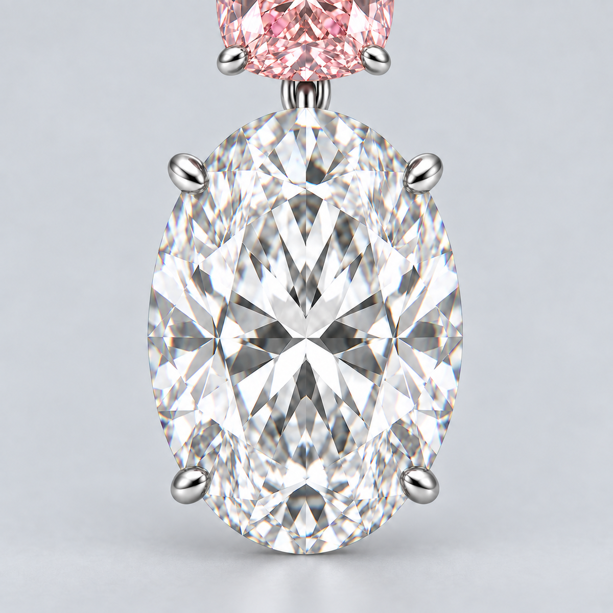 AI close-up illustration of the oval diamond drop and four platinum prongs, with the pink upper stone partly visible.