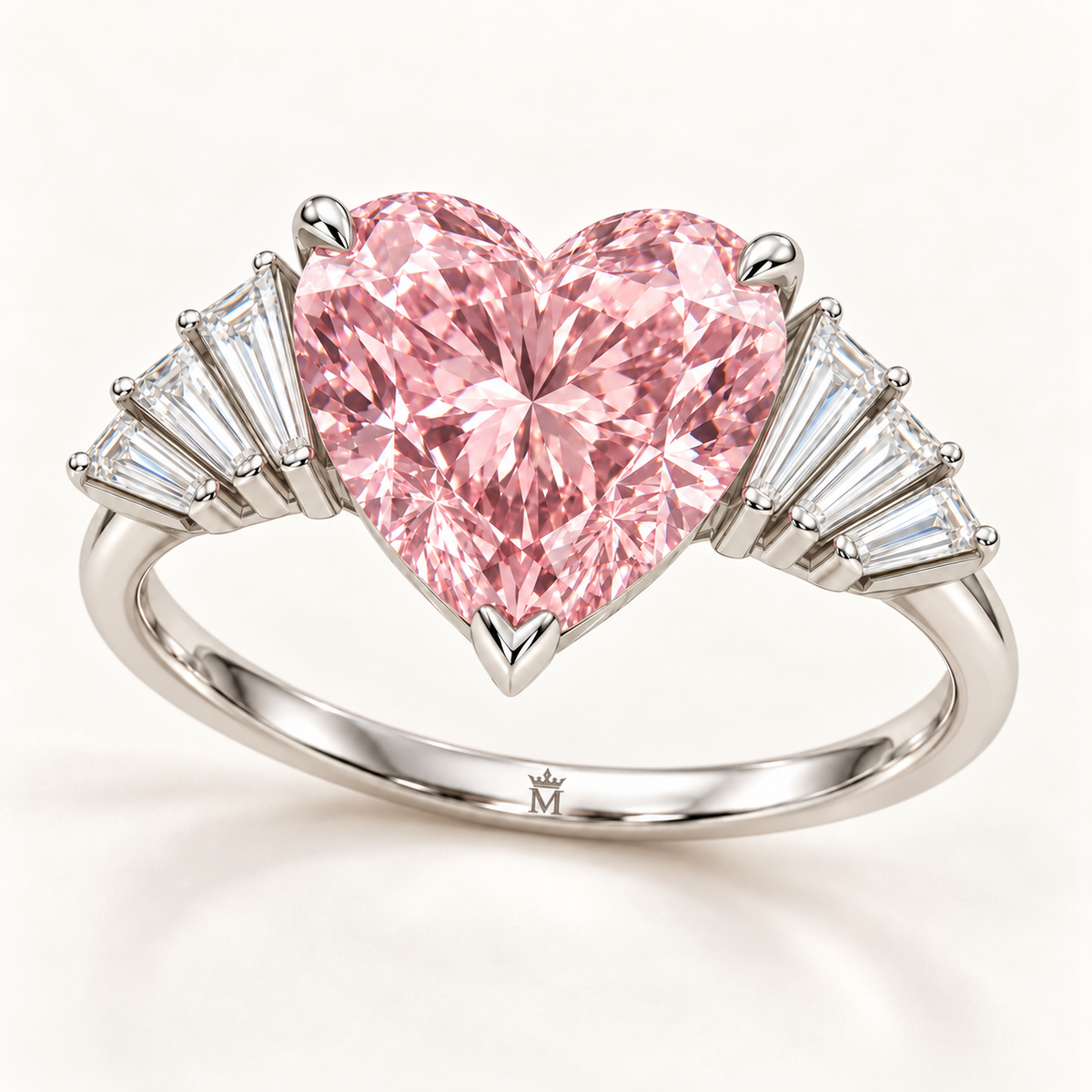Three-quarter view of the Pink Serenade ring with pink heart and four-baguette fan on each shoulder with official crown-M inner-band engraving
