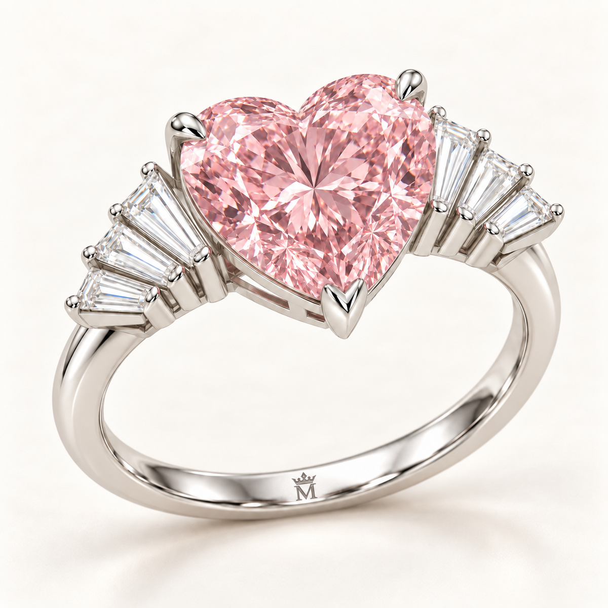 Oblique structural view of the Pink Serenade heart ring showing setting depth and connected band with official crown-M inner-band engraving