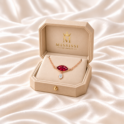 MISSISSI Red Balance marquise lab-grown ruby necklace in rose gold, presented in champagne octagonal packaging with crown M branding; design visualization.