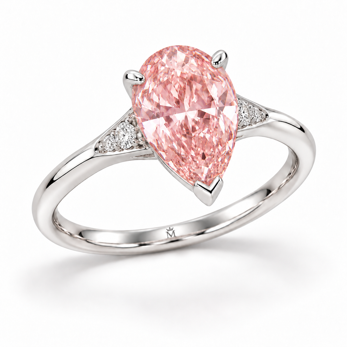 AI design visualization: Rosadew pear pink lab-grown diamond ring, left three-quarter view with discreet crowned-M engraving inside the lower shank.