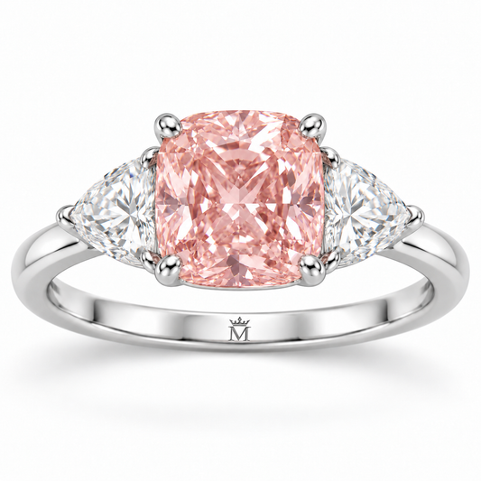 AI design visualization of Rosehaven with a pink cushion lab-grown center, triangular white side stones and a discreet crowned-M engraving inside the white-gold shank.