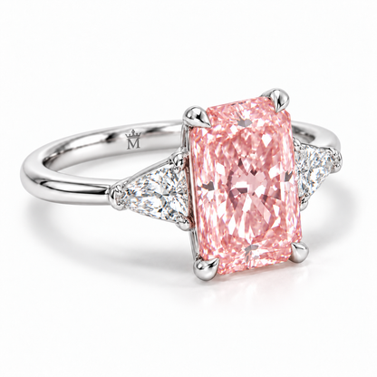 AI three-quarter visualization of Roseline's rectangular pink lab-grown center and triangular white side stones, with a discreet crowned-M engraving inside the white-gold shank.