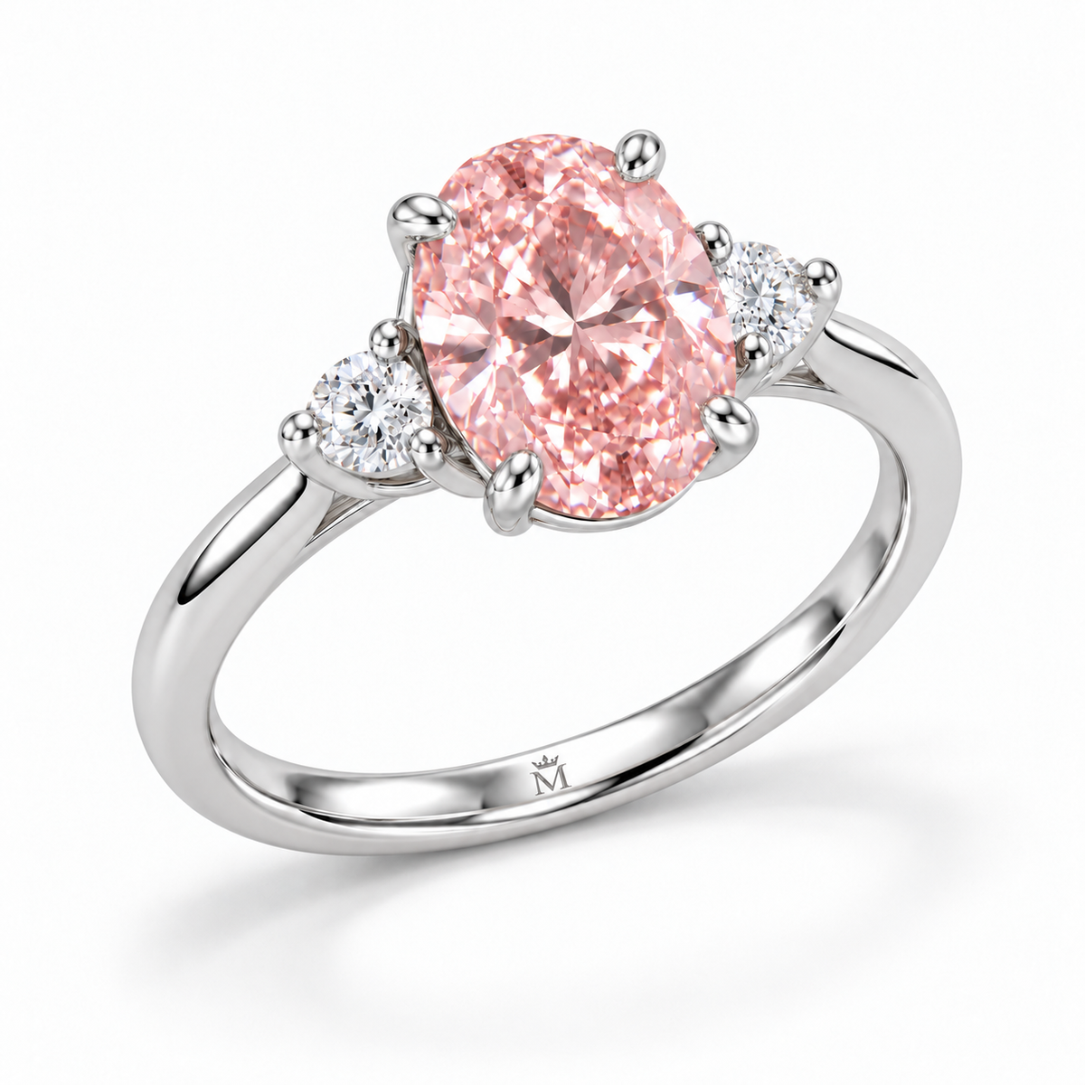 AI design visualization: Roselle soft oval pink lab-grown diamond ring, left three-quarter view with discreet crowned-M engraving inside the lower shank.