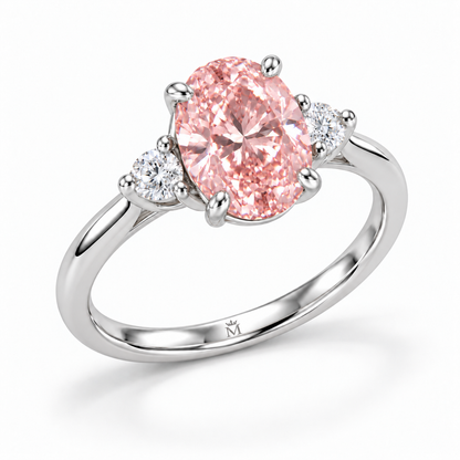 AI design visualization: Roselle soft oval pink lab-grown diamond ring, left three-quarter view with discreet crowned-M engraving inside the lower shank.