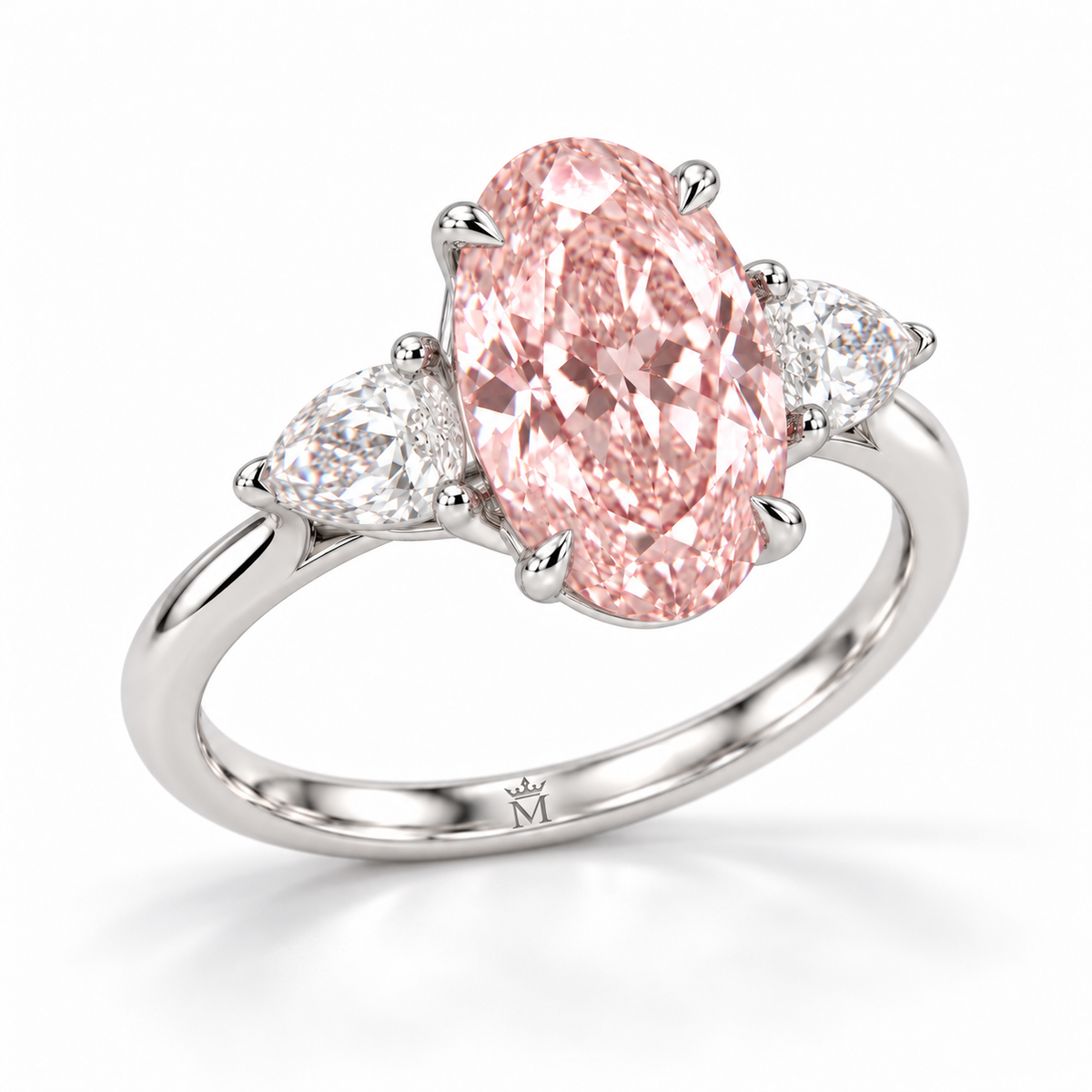AI three-quarter visualization of Rosemere's elongated pink oval lab-grown center, outward-pointing pear side stones and discreet crowned-M engraving inside the white-gold shank.