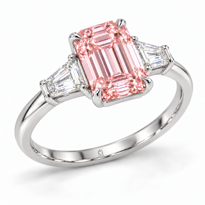 Left three-quarter AI design visualization of the Rosevault pink emerald-cut three-stone ring with discreet crowned-M inner-shank engraving.