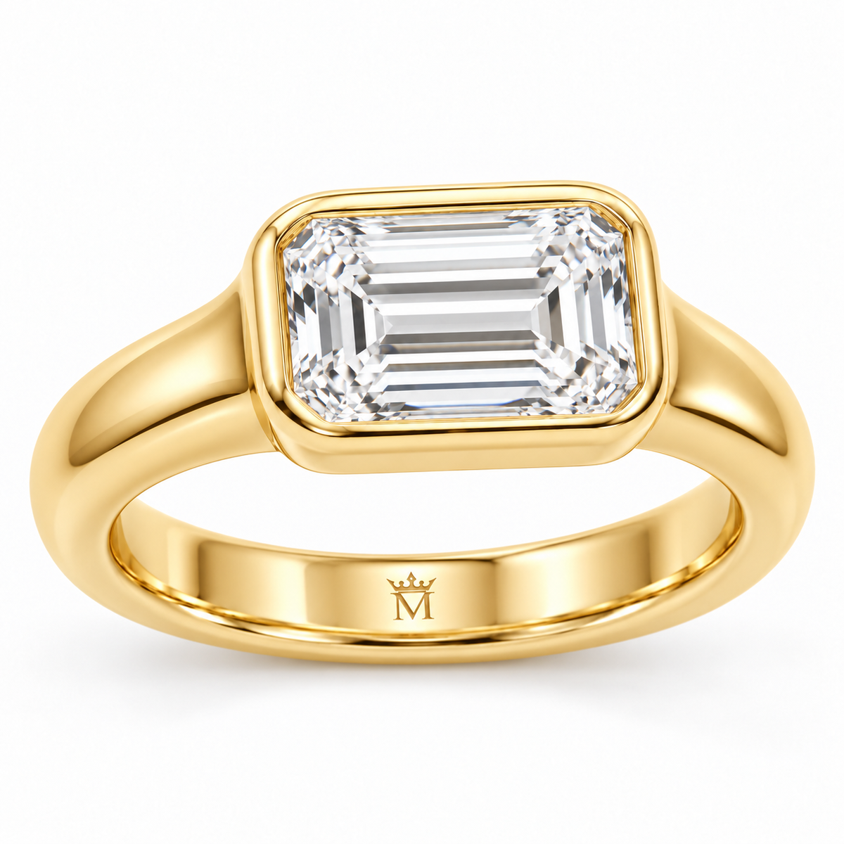 Serein east-west emerald-cut bezel engagement ring in 14K yellow gold, left three-quarter product view on white.