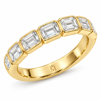 Solace east-west emerald-cut half-eternity wedding band in 14K yellow gold, right three-quarter product view on white.