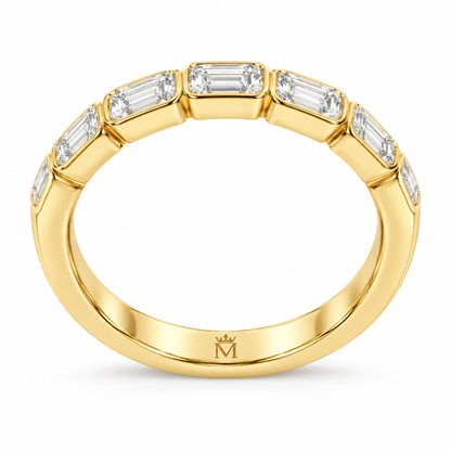 Solace east-west emerald-cut half-eternity wedding band in 14K yellow gold, side profile on white.