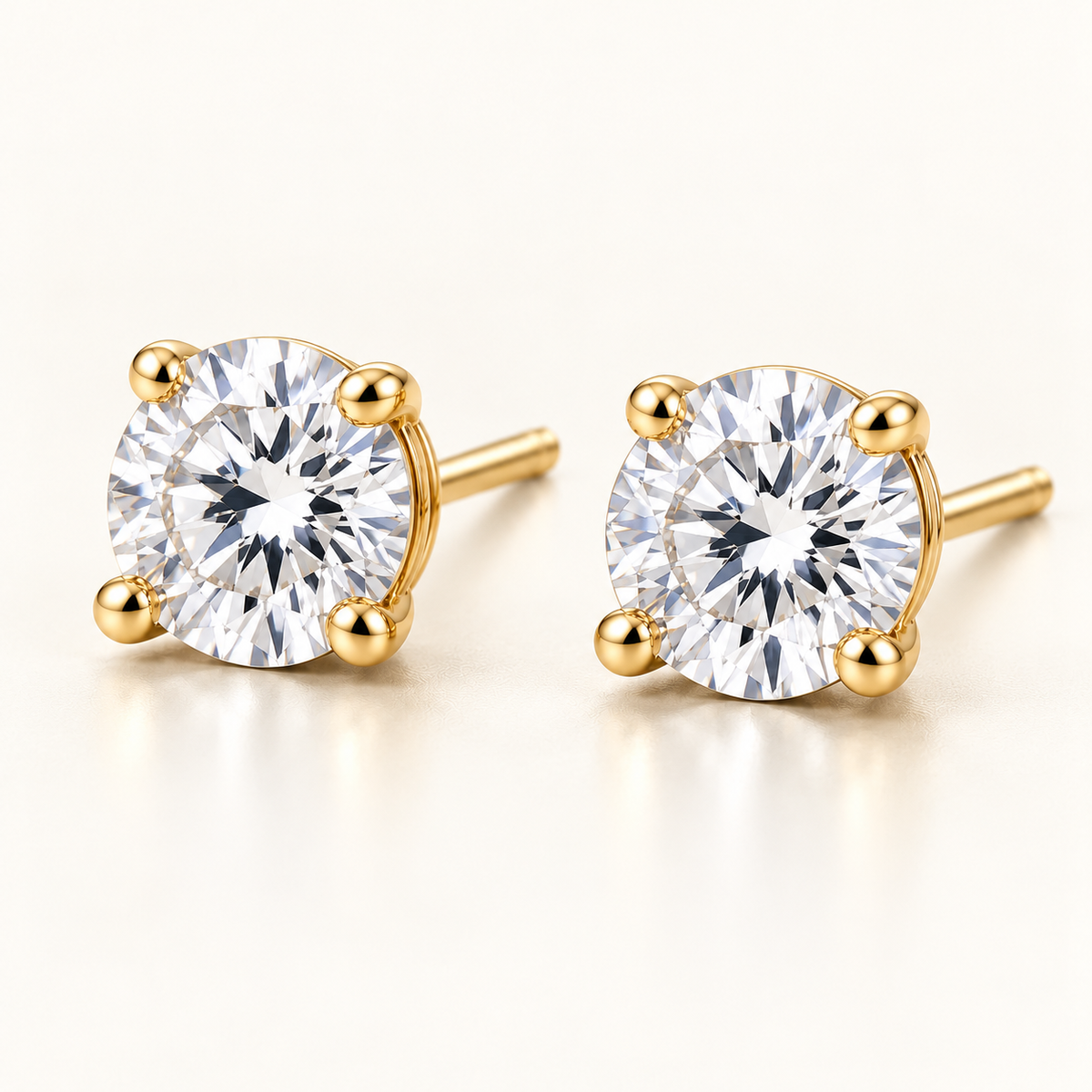 Round Solitaire Lab-Grown Diamond Stud Earrings 2.00 CTW in yellow gold, oblique front; design visualization