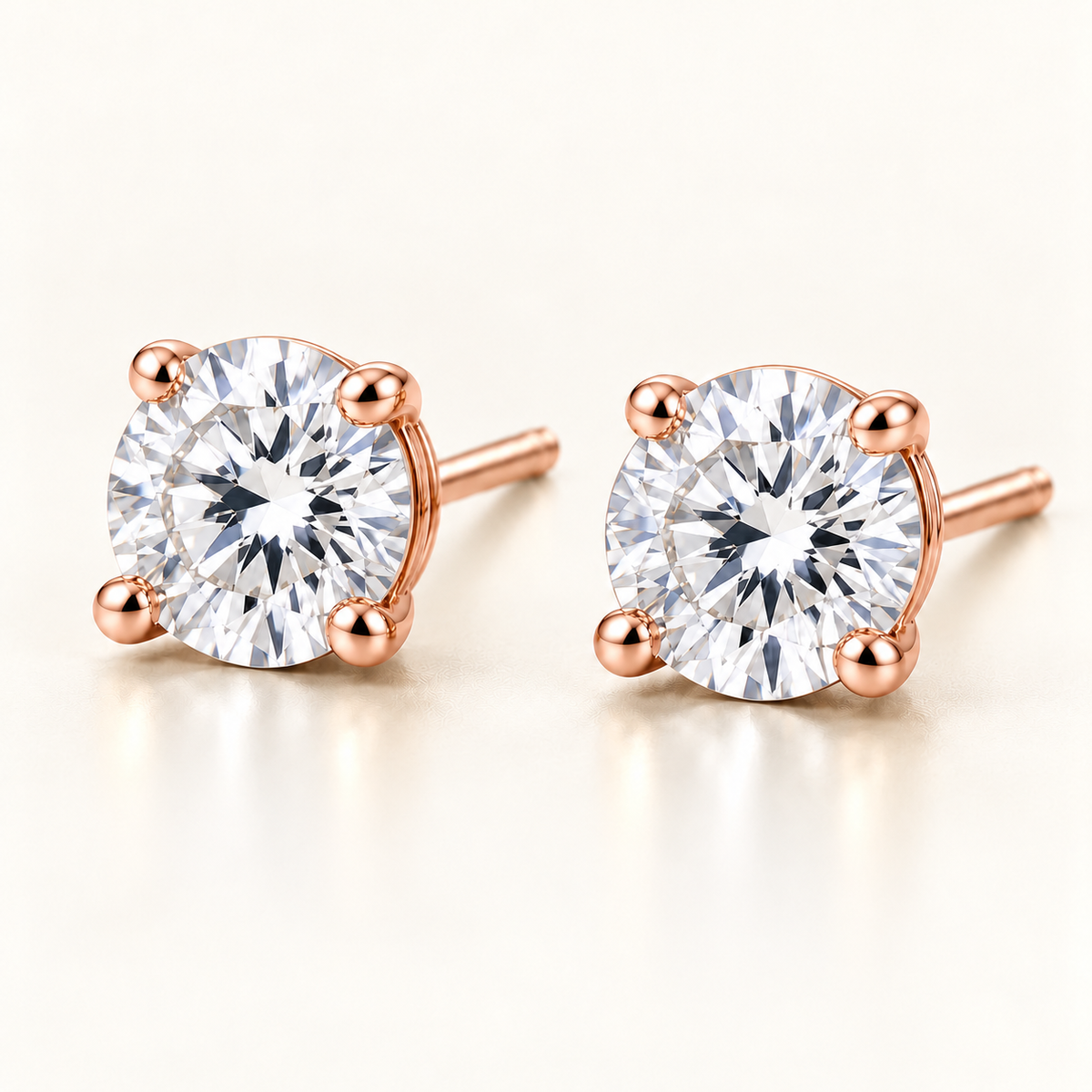 Round Solitaire Lab-Grown Diamond Stud Earrings 2.00 CTW in rose gold, oblique front; design visualization