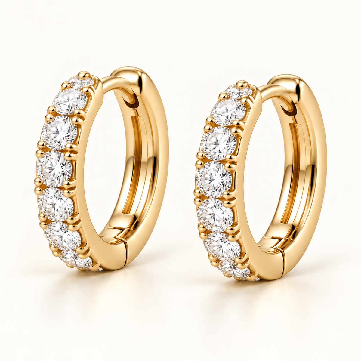 Round Lab-Grown Diamond Huggie Earrings 0.50 CTW in yellow gold, oblique front; design visualization