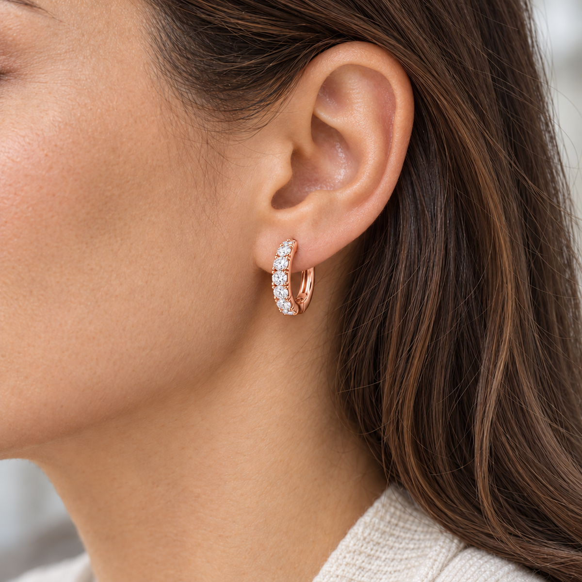 Round Lab-Grown Diamond Huggie Earrings 0.50 CTW in rose gold, worn; design visualization