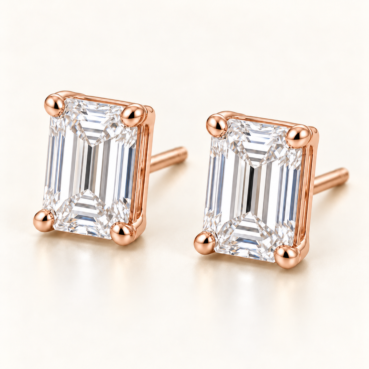 Emerald-Cut Lab-Grown Diamond Stud Earrings 2.00 CTW in rose gold, oblique front; design visualization