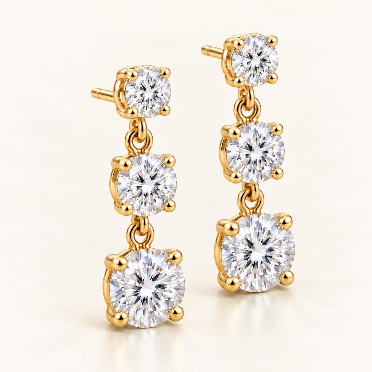 Graduated Three-Stone Lab-Grown Diamond Drop Earrings 3.00 CTW in yellow gold, three quarter; design visualization