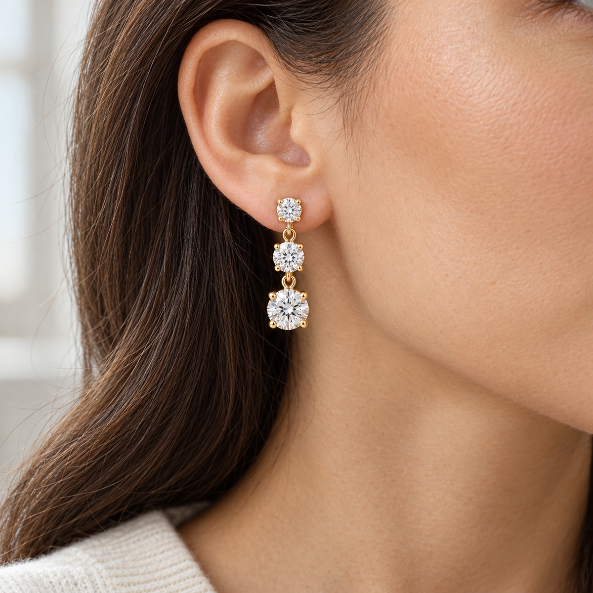 Graduated Three-Stone Lab-Grown Diamond Drop Earrings 3.00 CTW in yellow gold, worn; design visualization